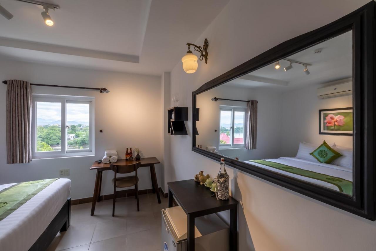Charming Riverside Hotel Хуе Екстериор снимка
